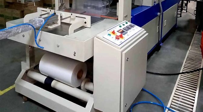 SEMI-AUTOMATIC SHRINK WRAPPING MACHINE